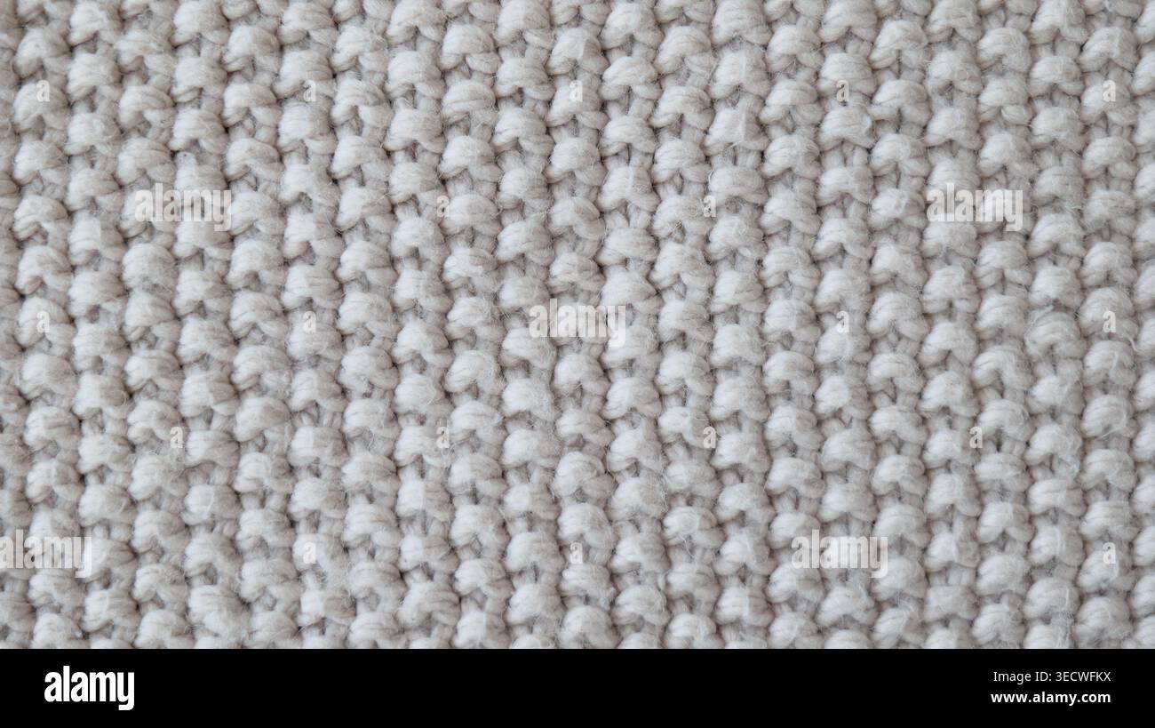 Beige Knitted Fabric Texture with Soft Cozy Pattern Stock Photo