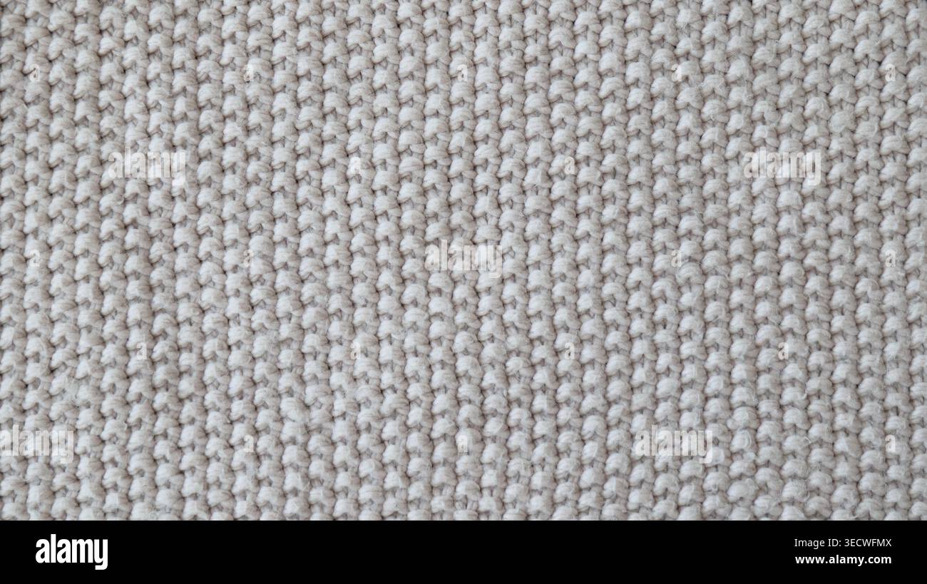 Beige Knitted Fabric Texture with Soft Cozy Pattern Stock Photo