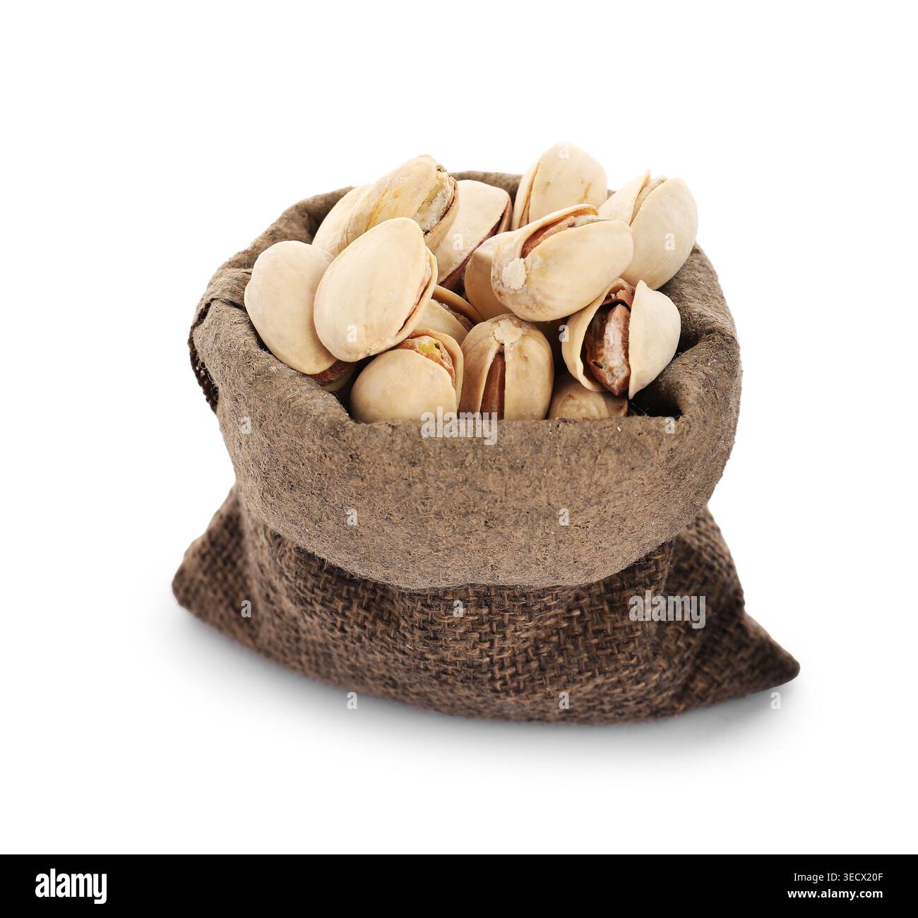 Pistachio nuts in sack isolated on white Stock Photo