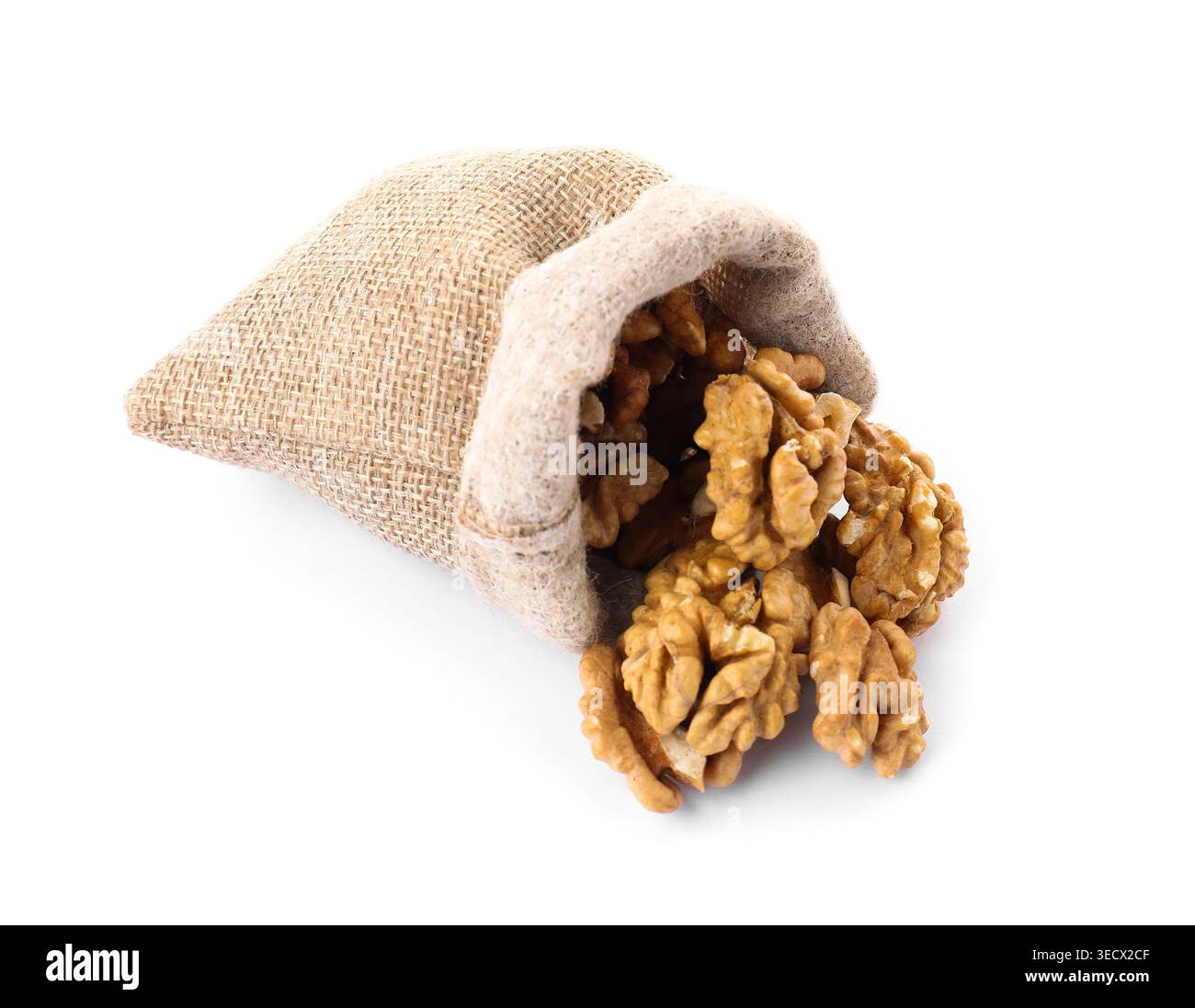 Walnuts in burlap bag isolated on white Stock Photo