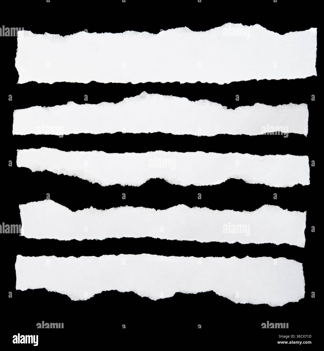 Ripped paper strips on black background Stock Photo