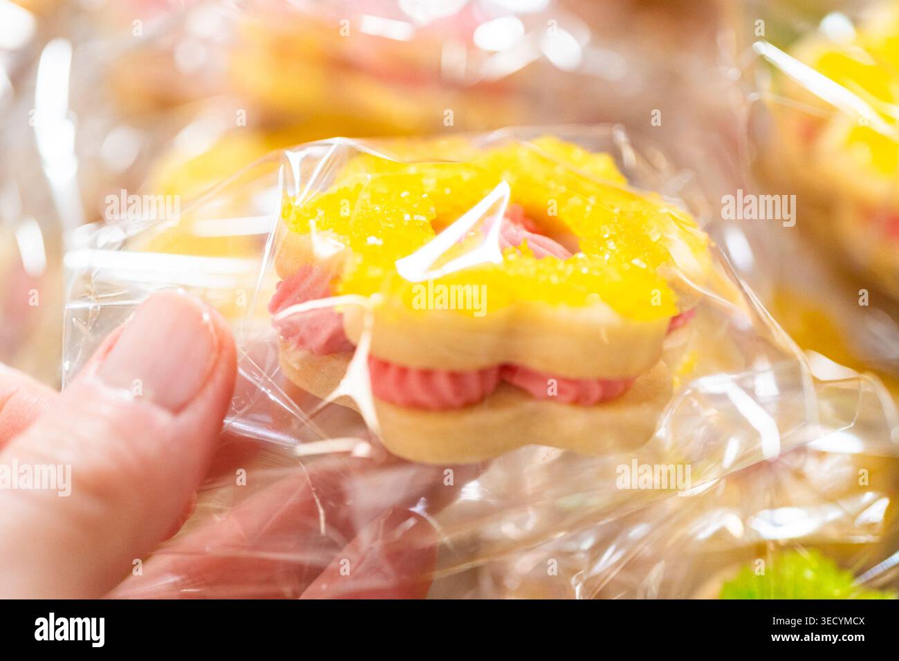 Wrapped Easter Cookie Sandwiches in Basket Stock Photo