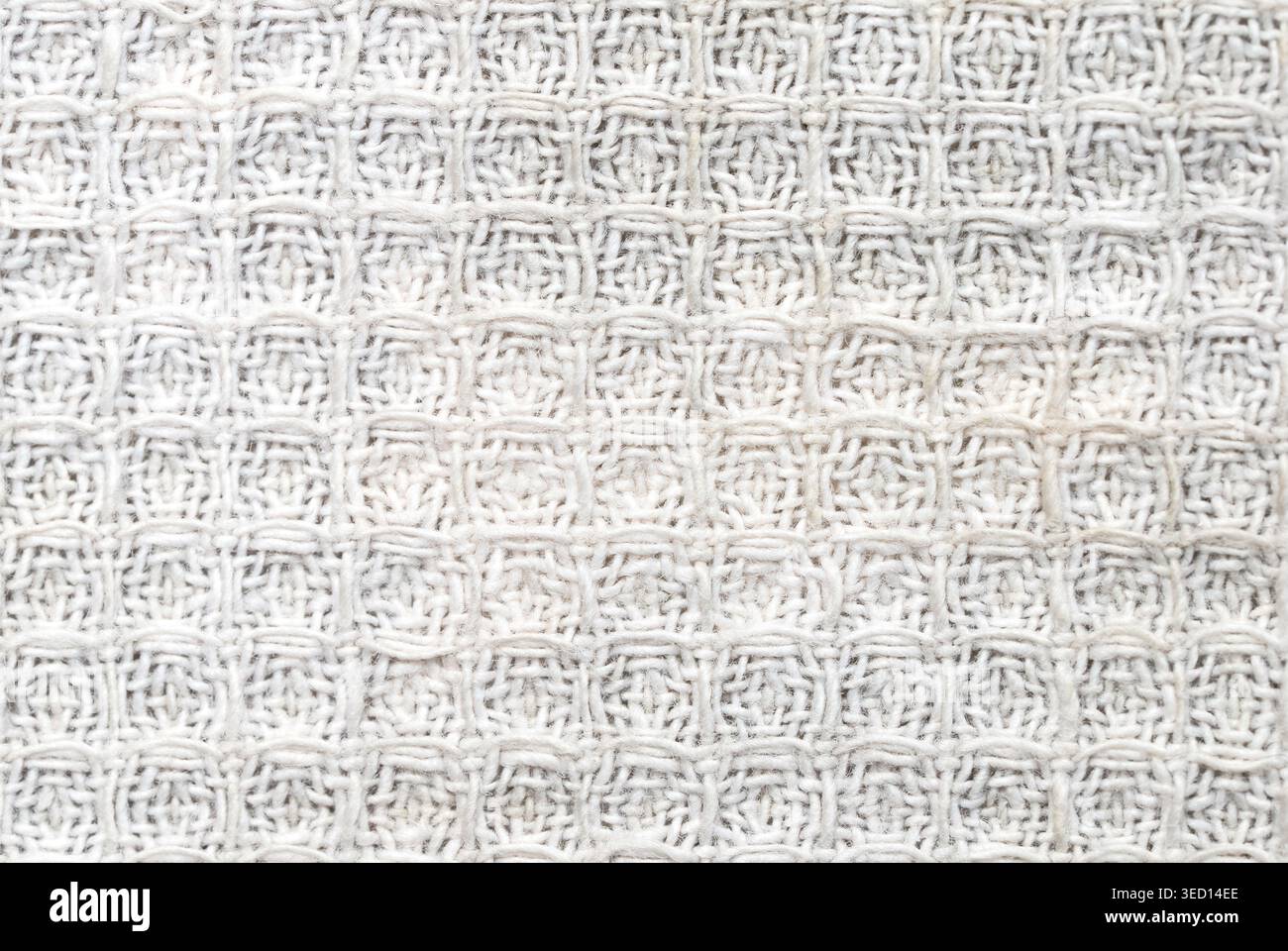Crochet knitted square pattern white colour macro Stock Photo