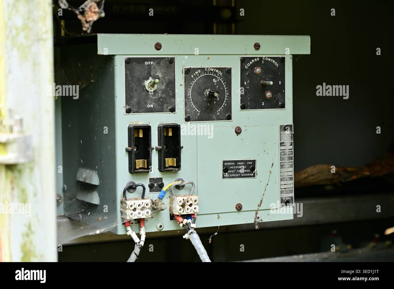 Old electrical control unit in rusty outdoor enclosure, UK Stock Photo