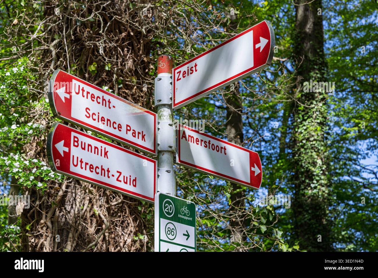 Red directional signs showing hi-res stock photography and images - Alamy