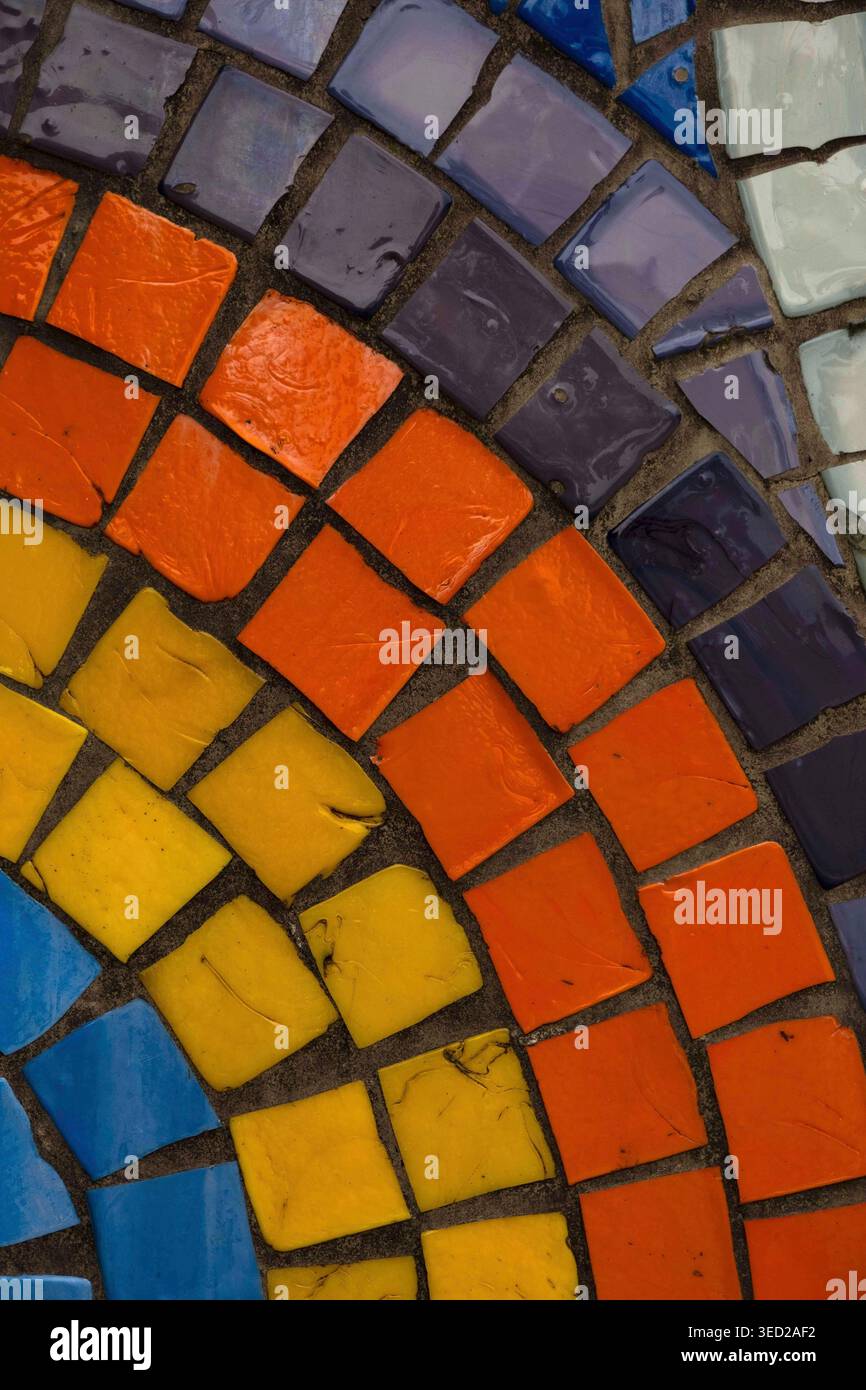 Vibrant multi colored ceramic mosaic tiles in a decorative pattern Stock Photo