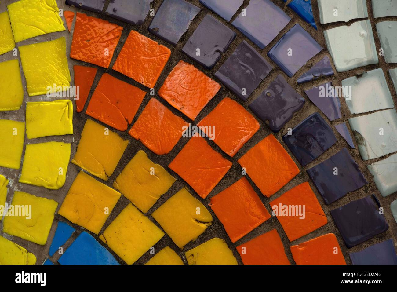 Vibrant multi colored ceramic mosaic tiles in a decorative pattern Stock Photo