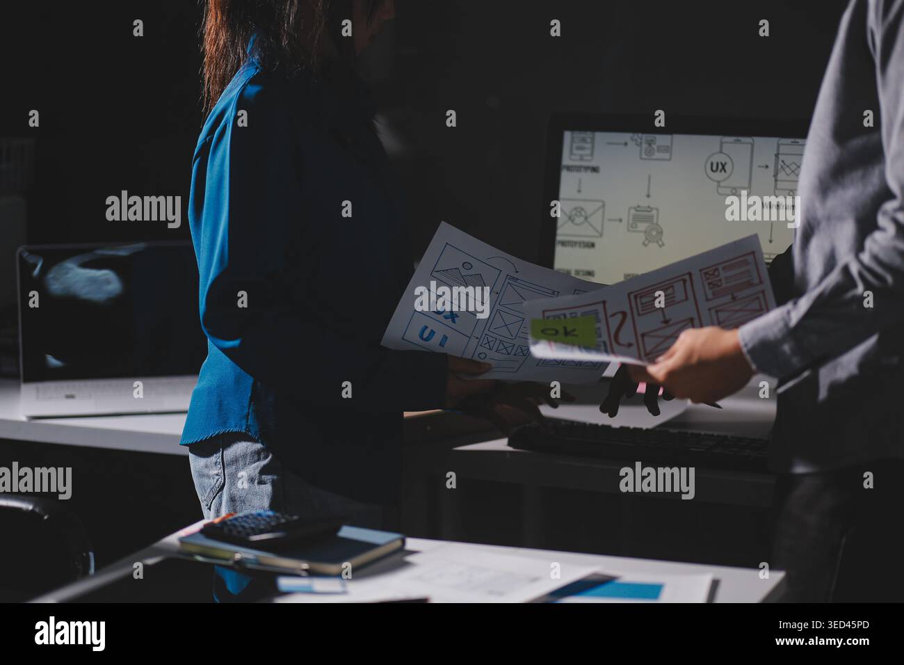 Team of Program Developer Collaborating on UXUI Design Planning in a Modern Office Environment Stock Photo