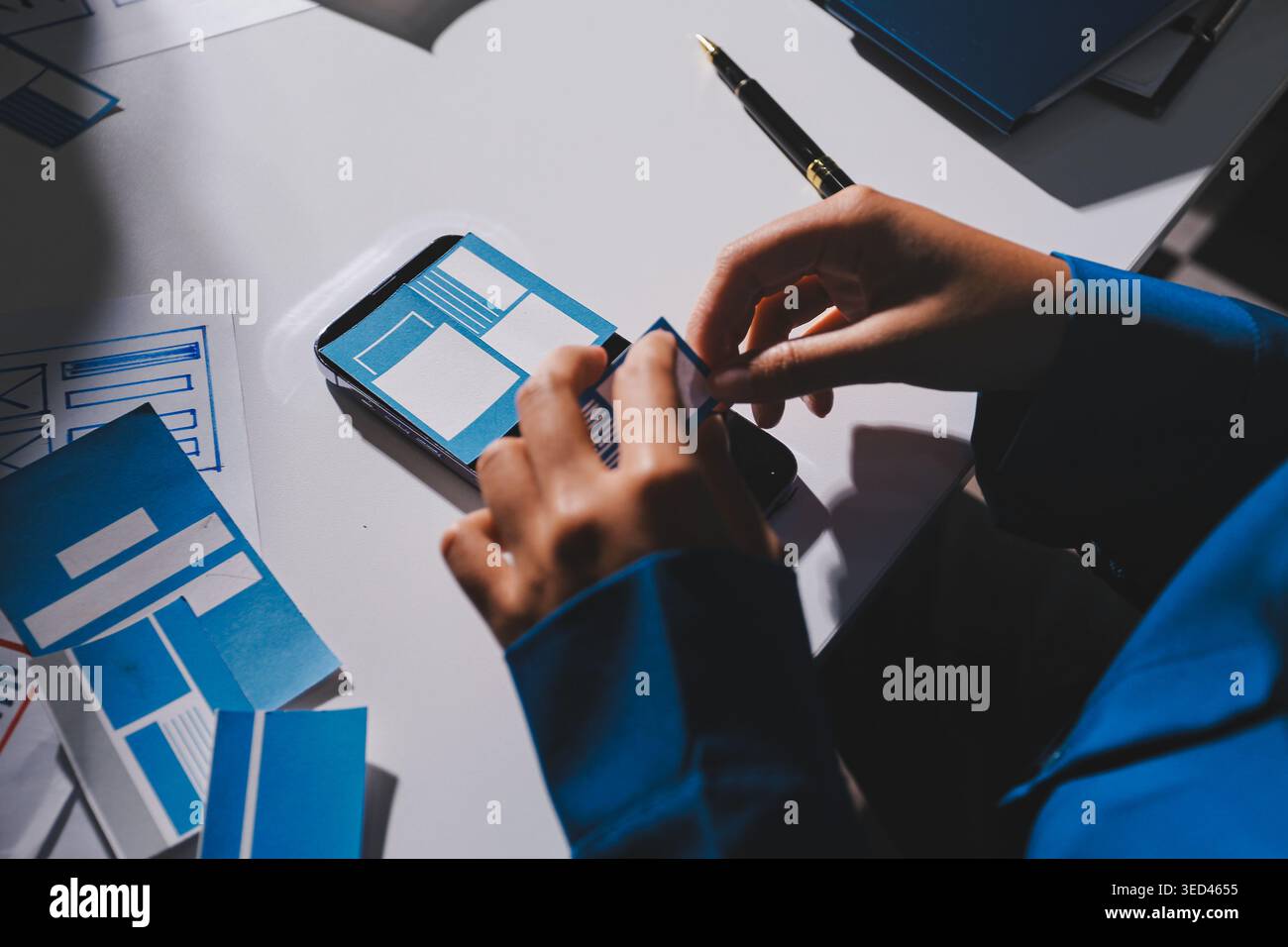Team of Program Developer Collaborating on UXUI Design Planning in a Modern Office Environment Stock Photo