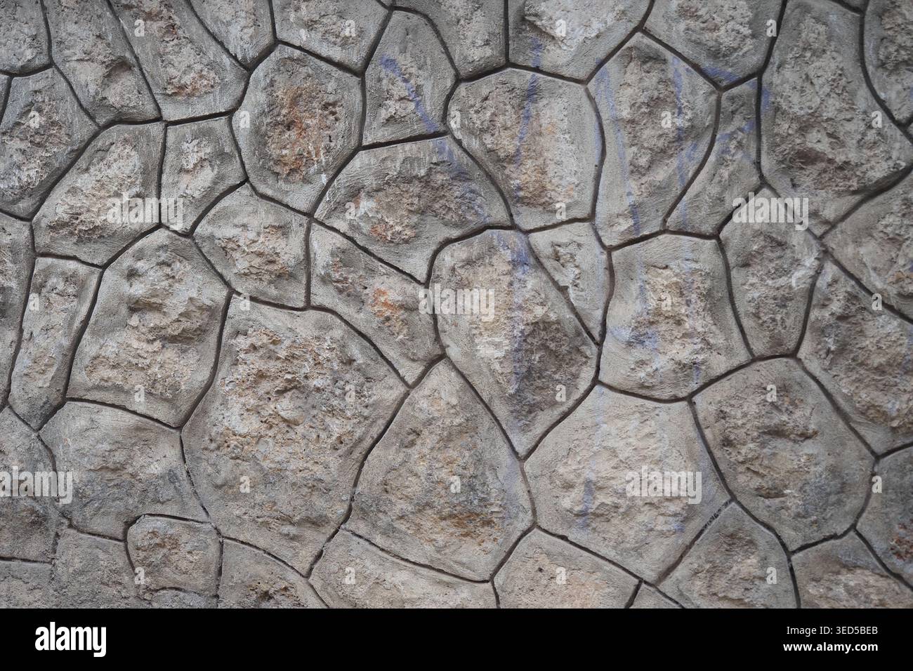 Stone wall with unique patterns and textures Stock Photo