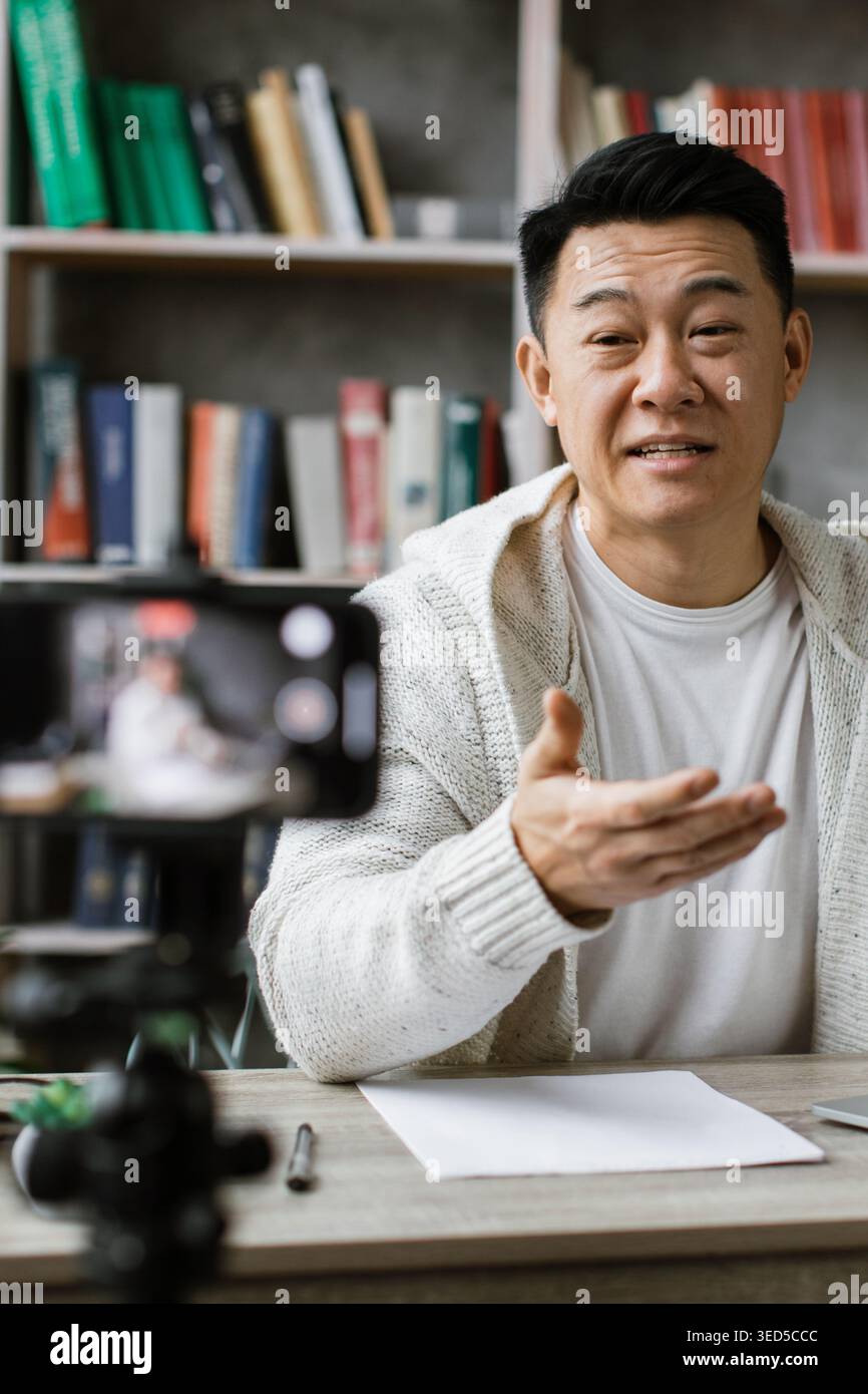 Man Recording Online Content Stock Photo