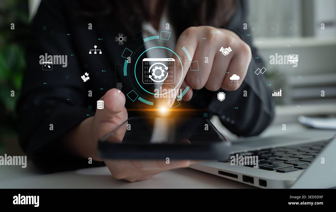Professional using smartphone with digital interface displaying technology icons for data analysis and communication in modern workspace setting Quark Stock Photo