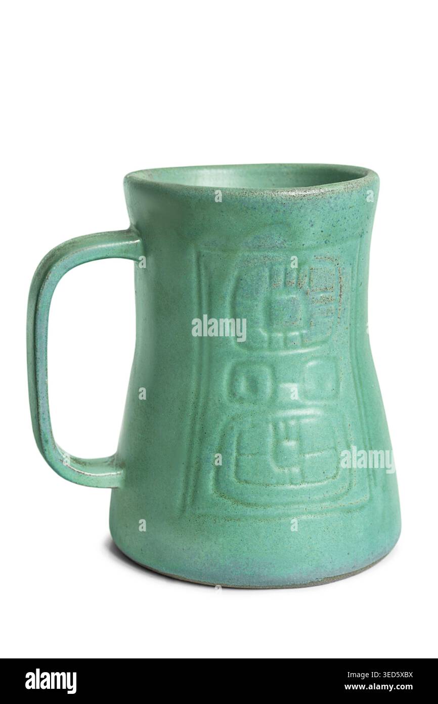 Large green craft ceramic mug isolated on white background Stock Photo