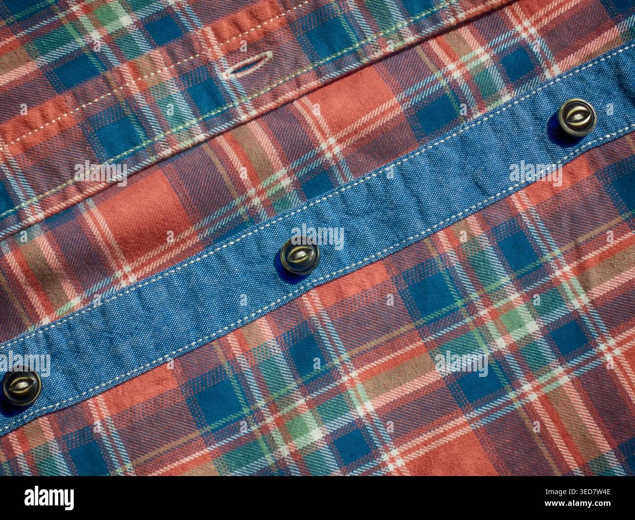Blue-red check, cuffs, button, textile background Stock Photo