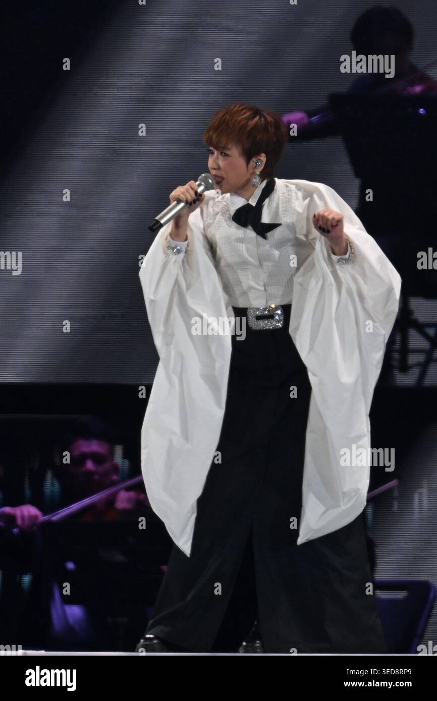 Priscilla Chan Wai Han, a Hong kong singer singing on the stage at the ...