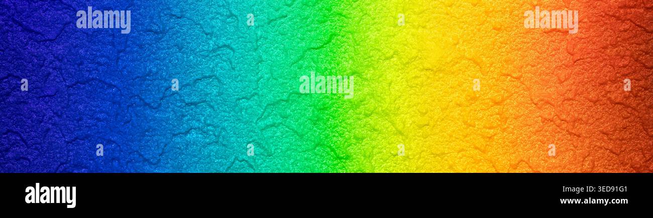 Real abstract rainbow colored textured wall background with bright spectrum gradient panorama Stock Photo