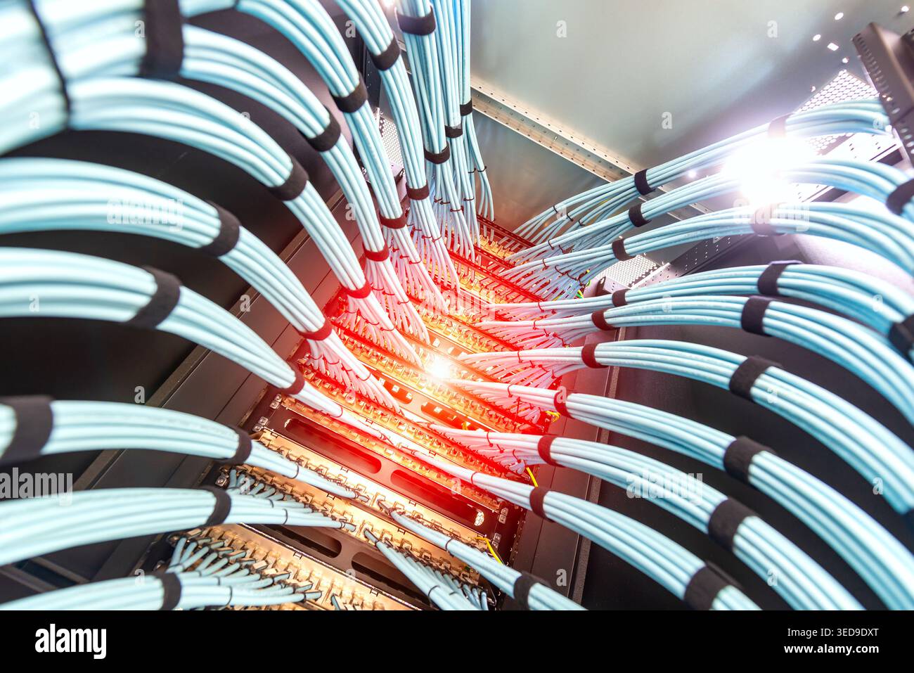 This image showcases an intricate cable management system within a ...