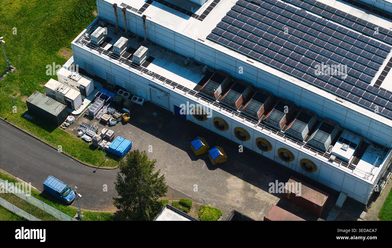 Aerial view of a data centre facility featuring solar panels on the ...