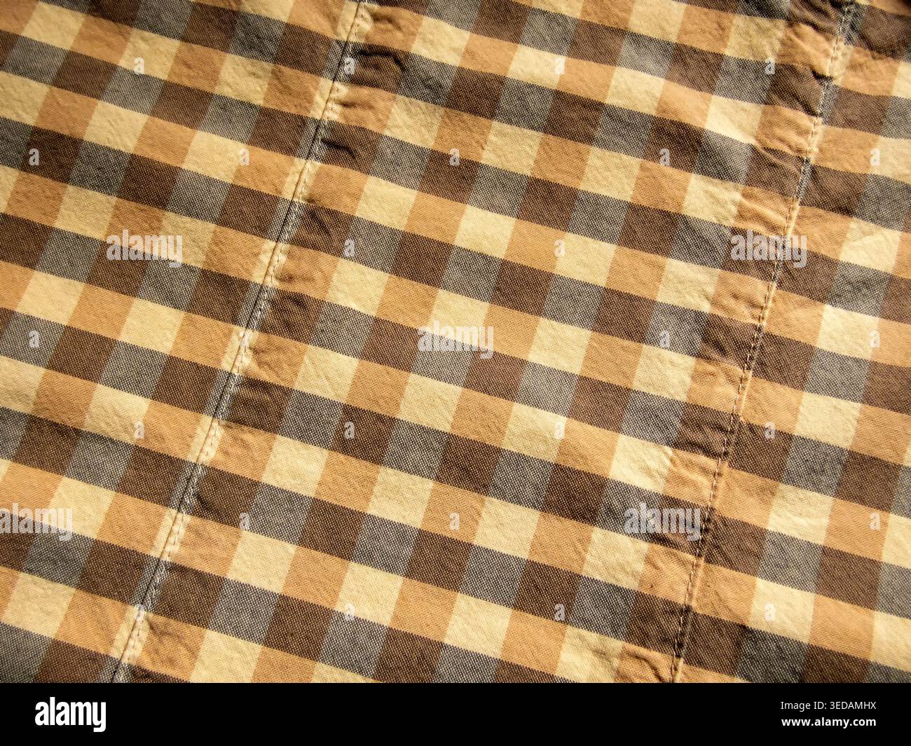 Yellow-gray check fabric background macro Stock Photo