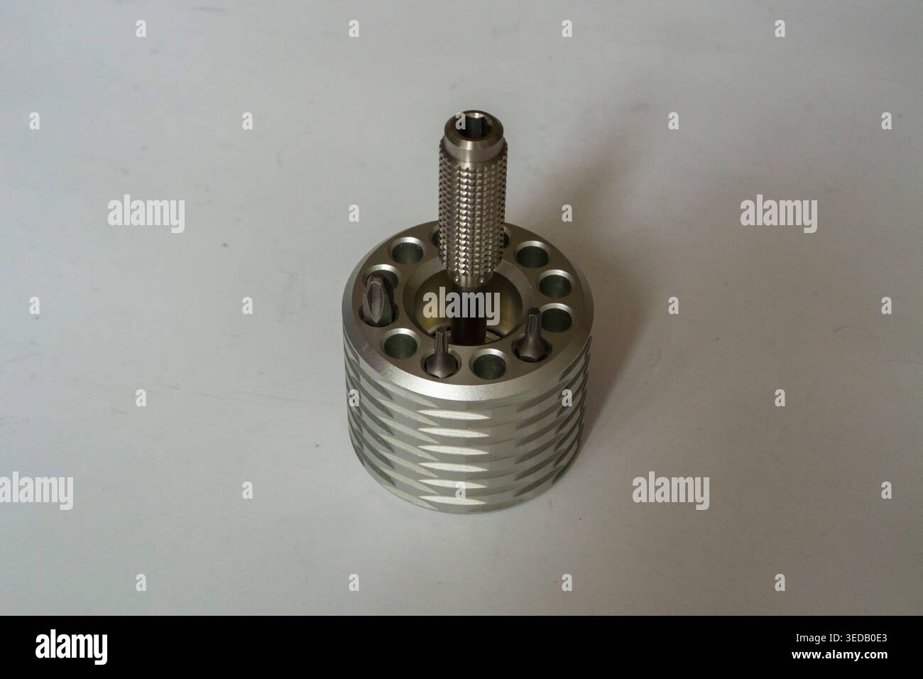 Screwdriver in a stand with bits tools for work and hobby Stock Photo