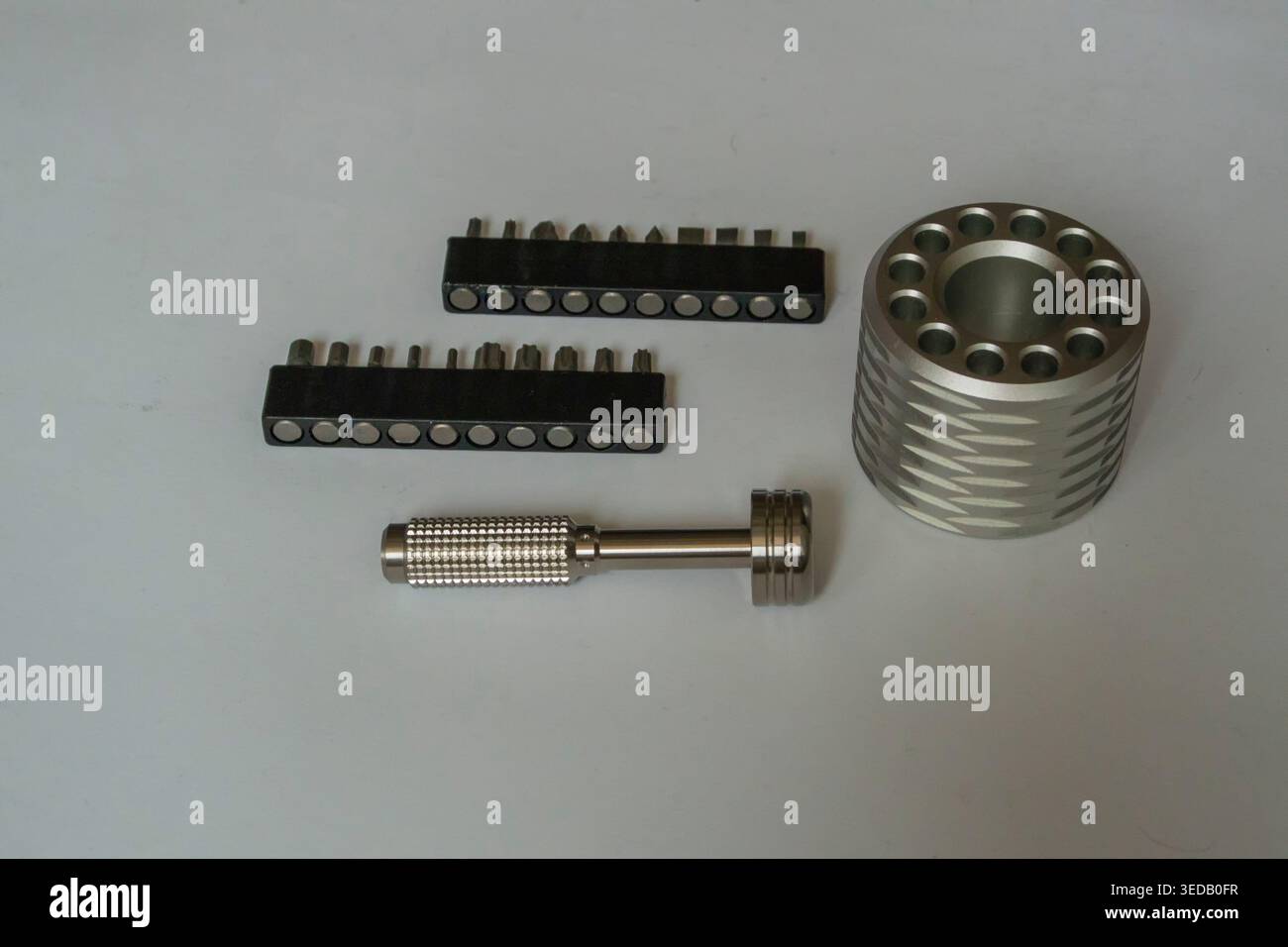 Titanium screwdriver, stand, bits for hobby and work Stock Photo
