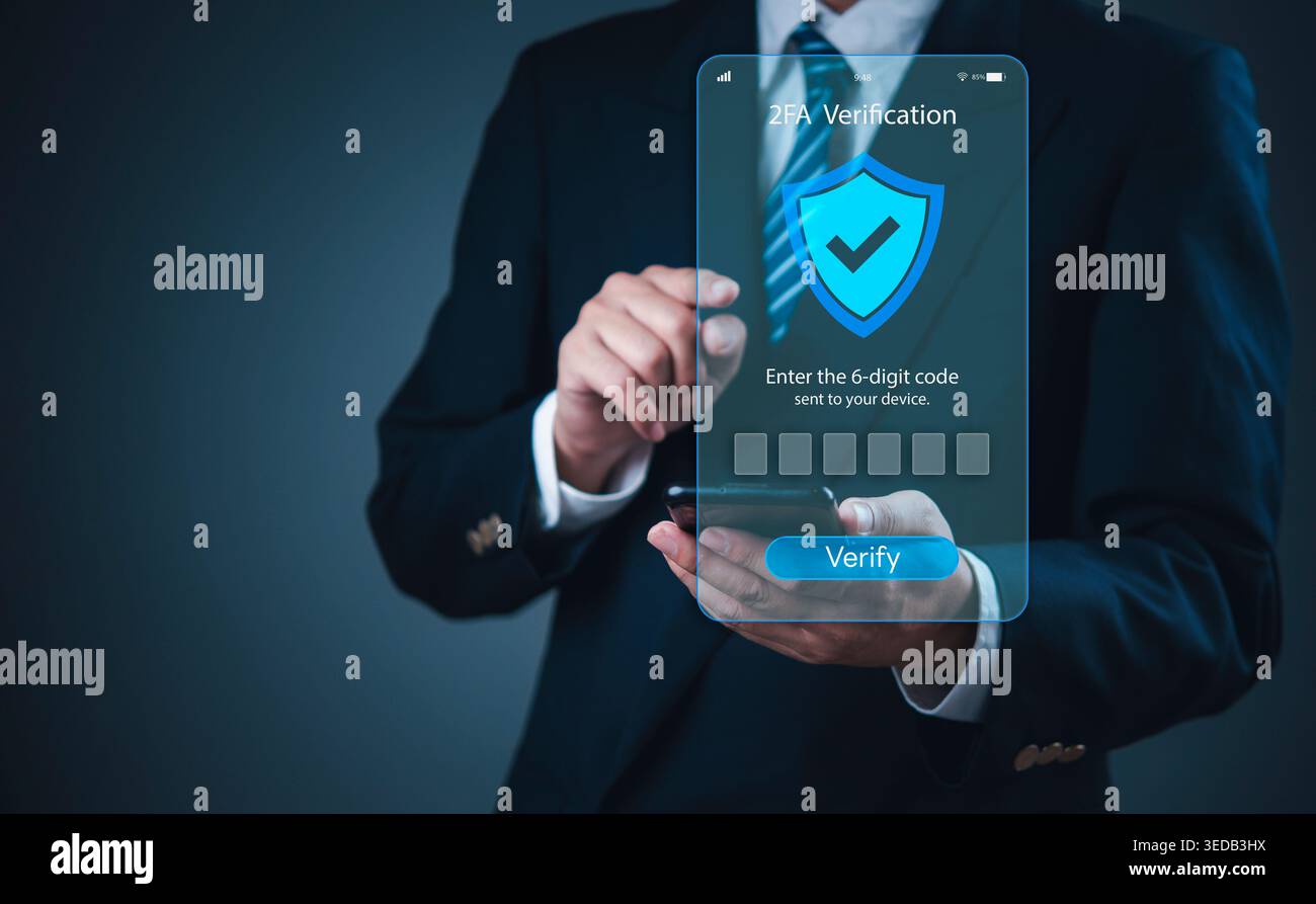 Businessman using smartphone for 2FA two-factor authentication security verification. Mobile banking app concept with shield icon and OTP code entry f Stock Photo