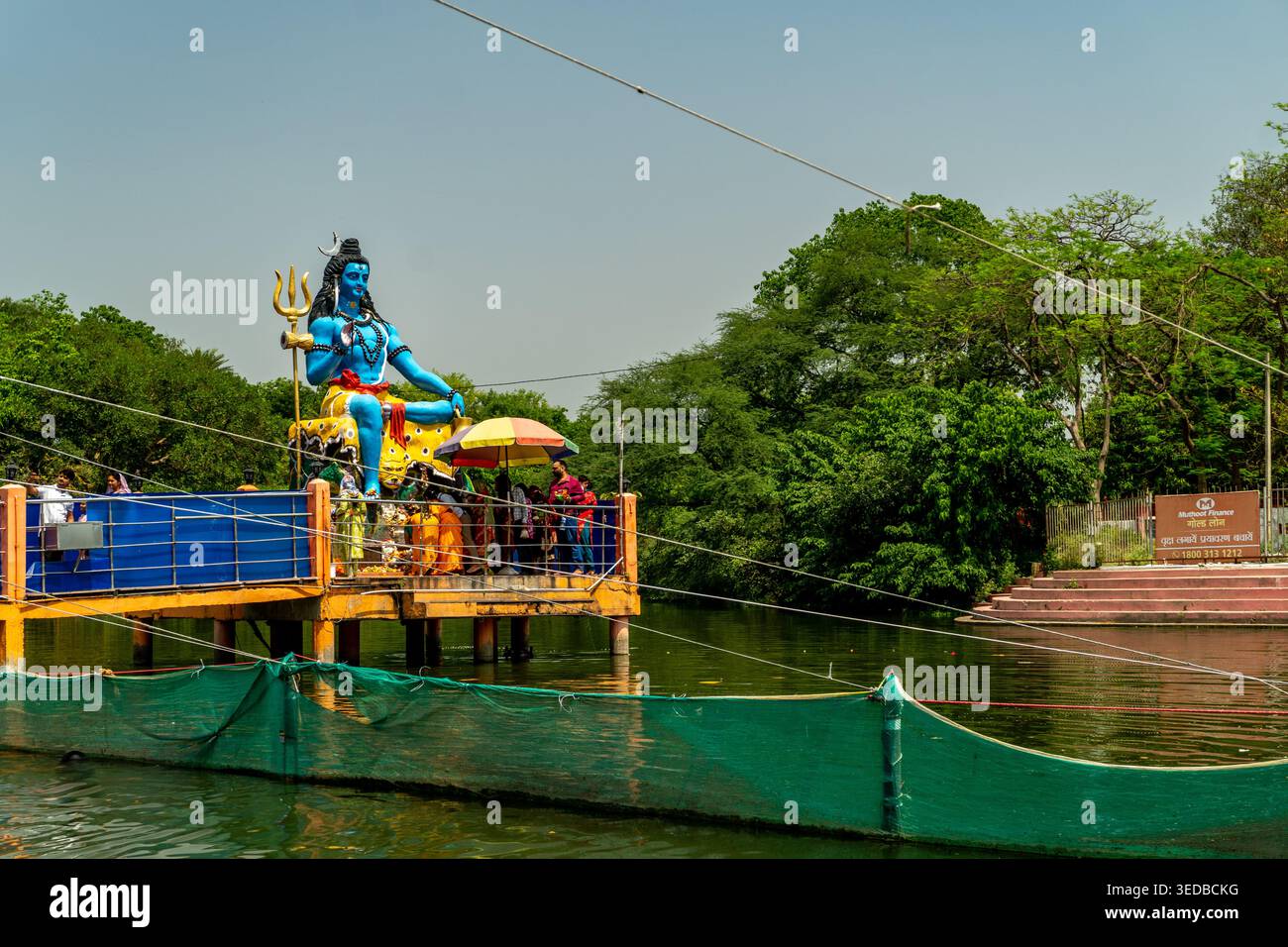 April15th2026 Lucknow India. Shiva statue at lakeside Chandrika Devi ...