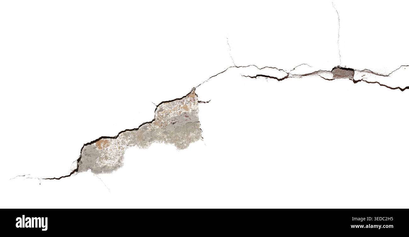 Large peeled plaster with spreading cracks isolated white background Stock Photo