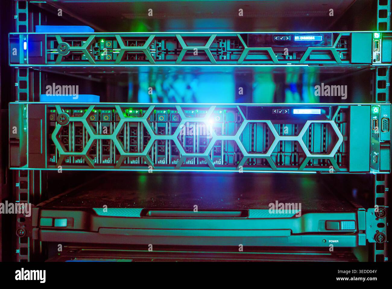 Explore a high-tech data center server rack showcasing advanced server equipment with vibrant lights, symbolizing modern technology and efficient data Stock Photo