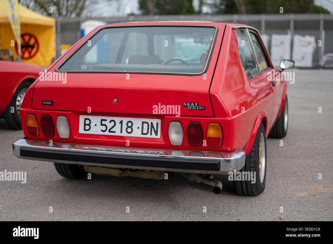 Rear three-quarter view of a classic red Seat 128 1430 sports coupe ...