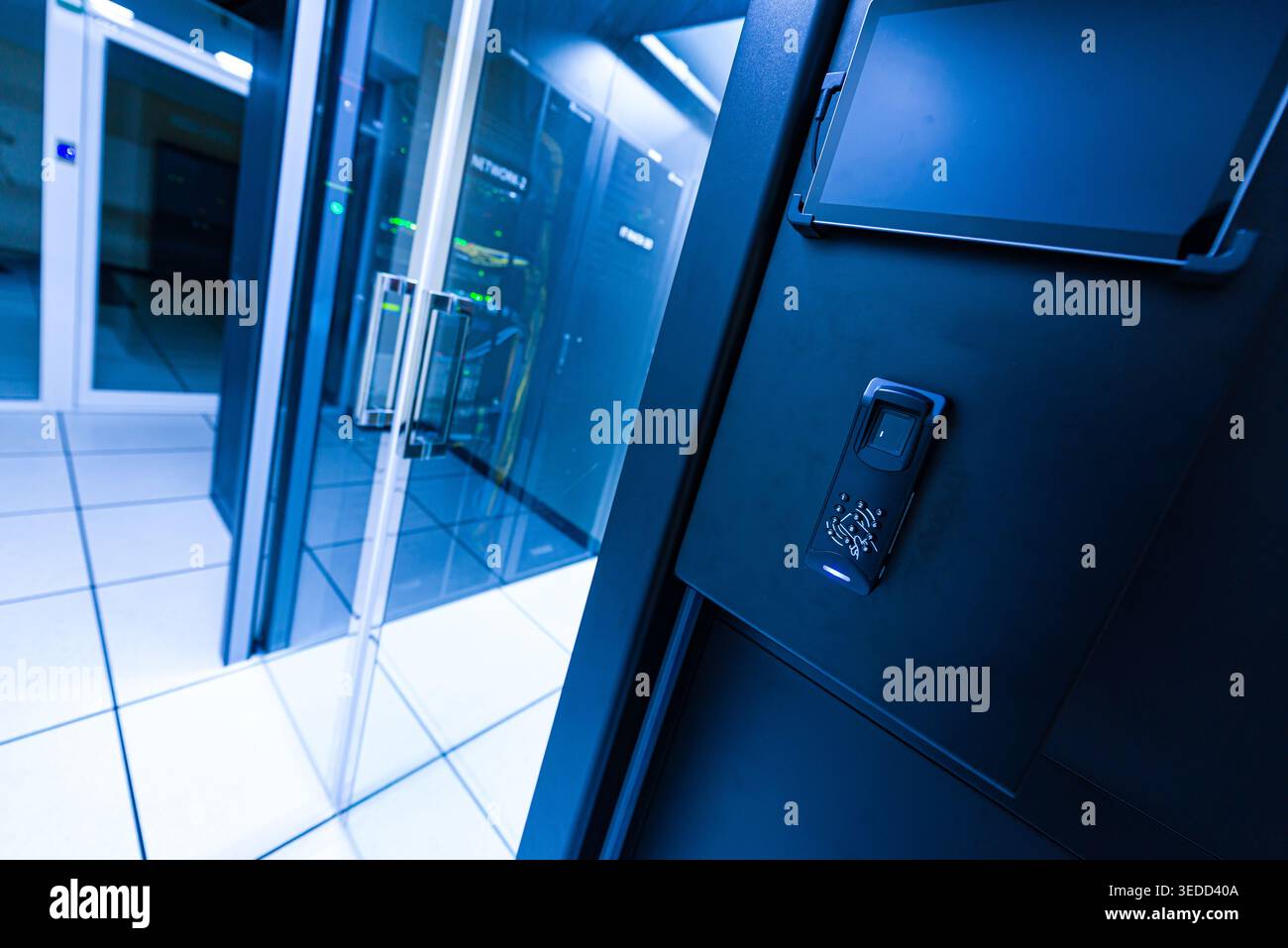 This image showcases a modern data center featuring an electronic access control system, emphasizing security and advanced technology in infrastructur Stock Photo