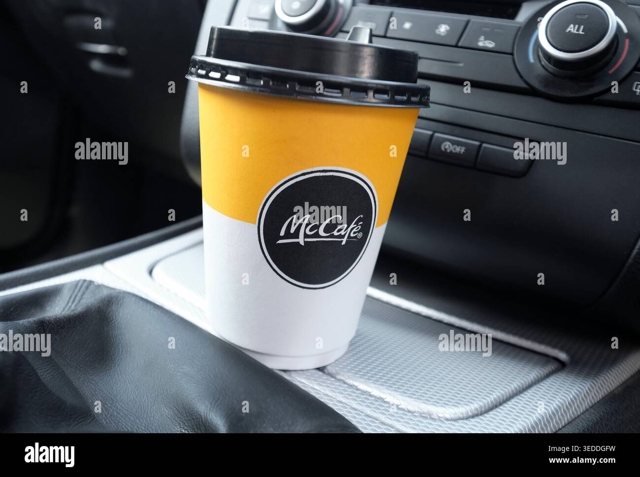McDonald's McCafe coffee inside car interior Stock Photo