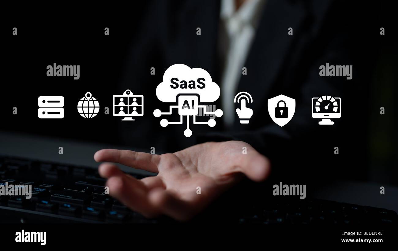 A business professional showcases the concept of SaaS and AI in a modern office. The image features technology icons that represent digital solutions Stock Photo