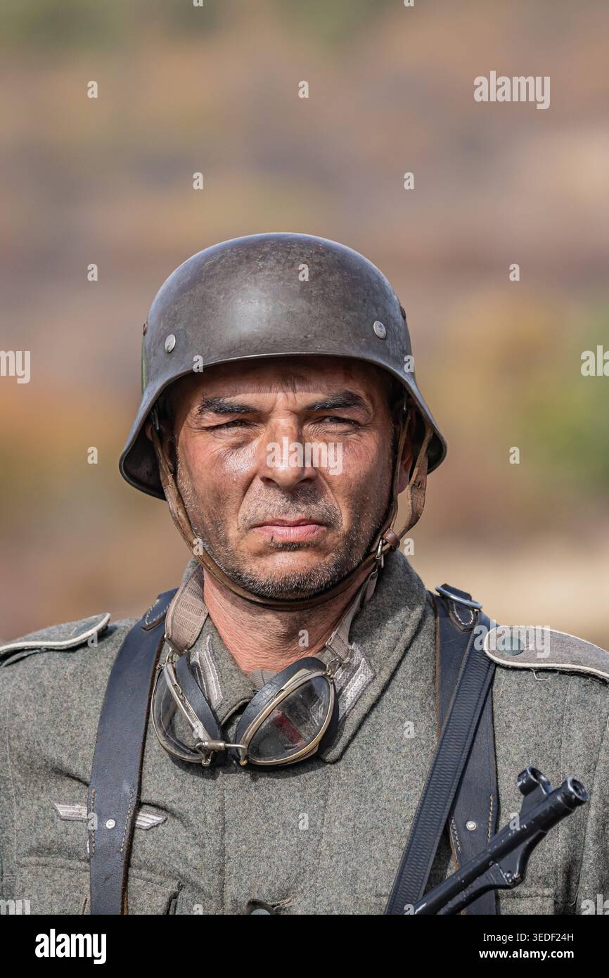 Veliko Tarnovo, Bulgaria. October 22, 2023. Reenactors in the uniforms of German and Russian soldiers recreating a battle from World War II. Stock Photo