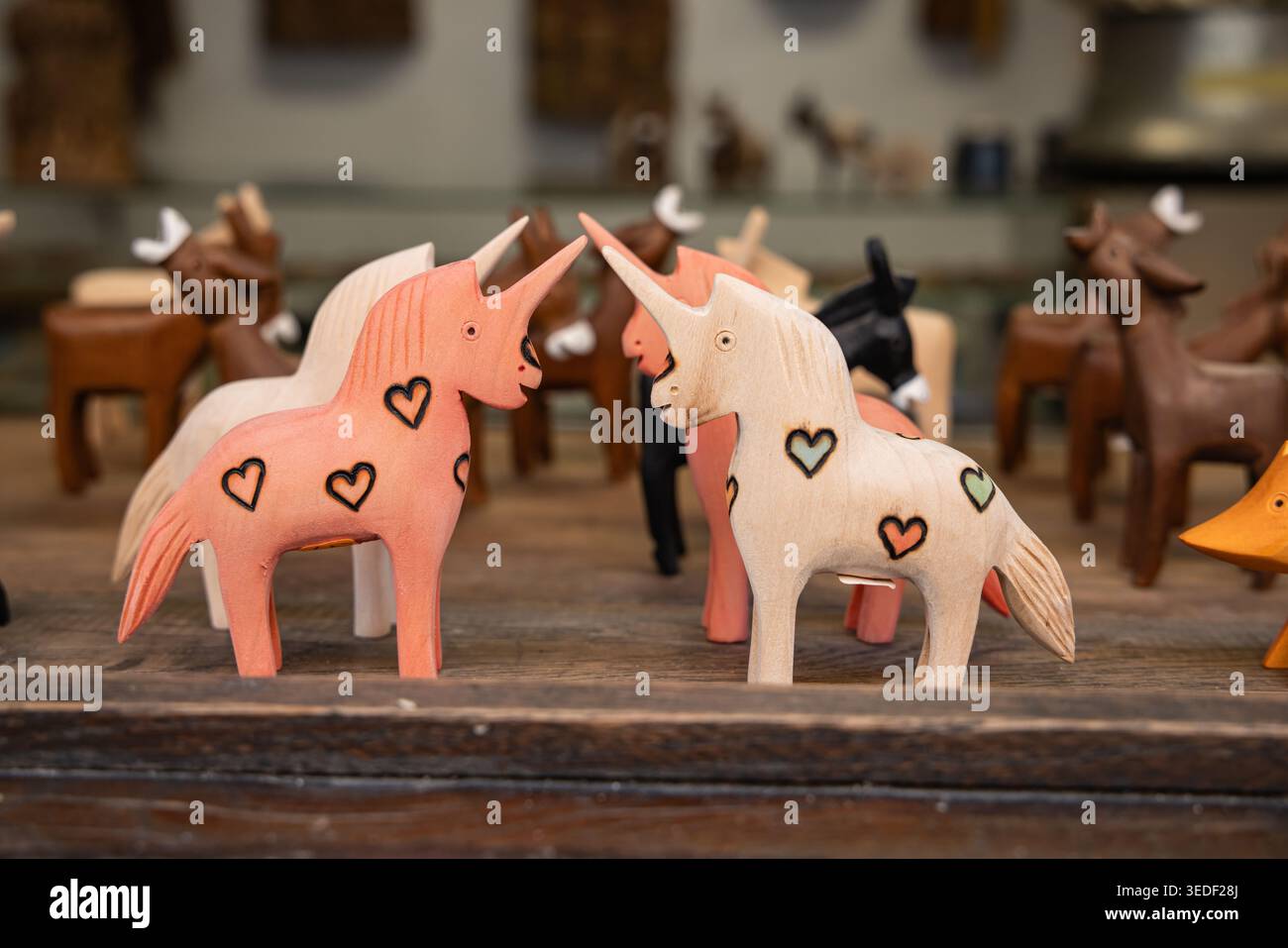 Veliko Tarnovo, Bulgaria. October 22, 2023. Carved wooden unicorn souvenirs in Veliko Tarnovo. Stock Photo
