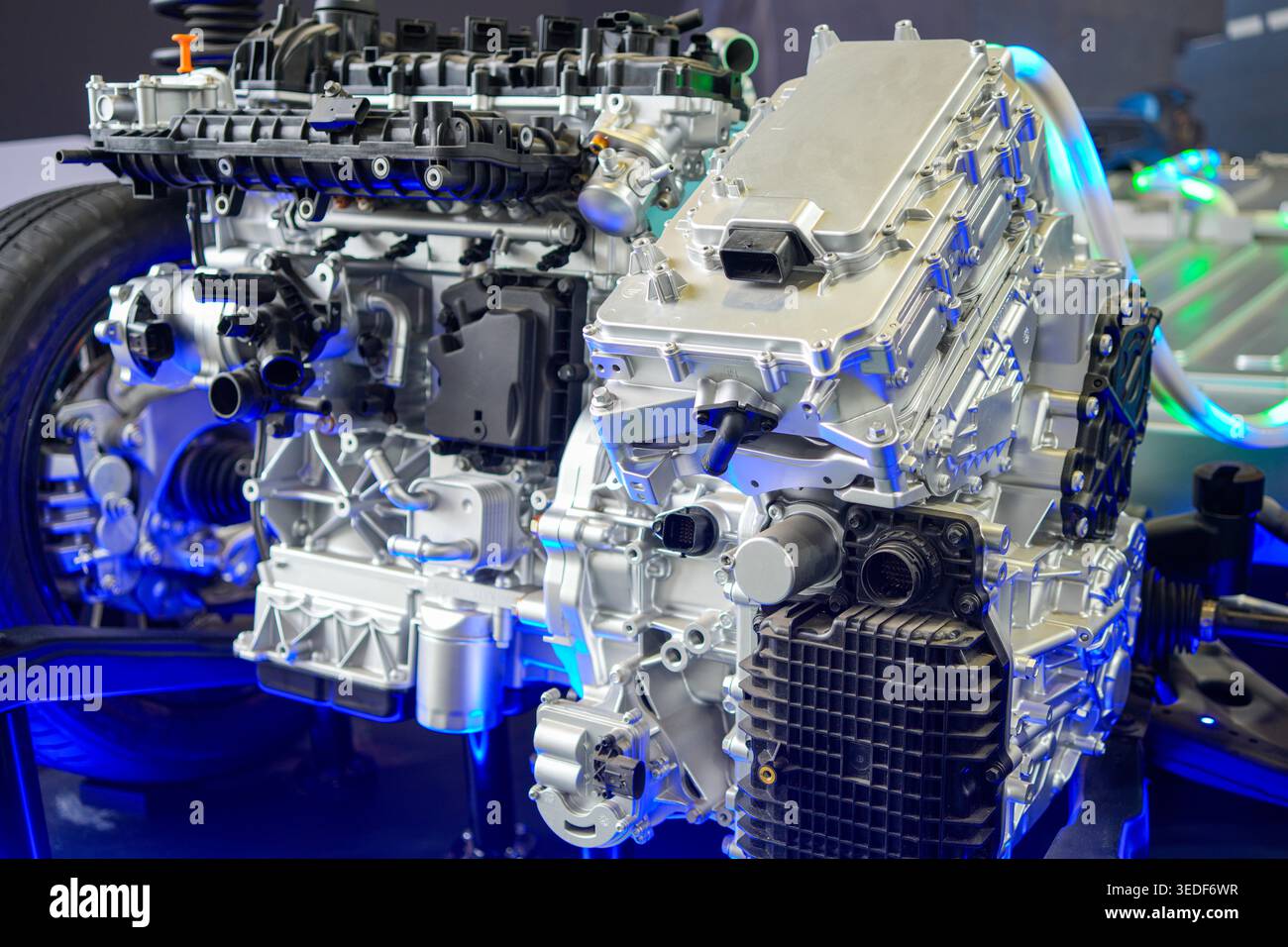 Close-up of hybrid vehicle engine and chassis module showing electric ...