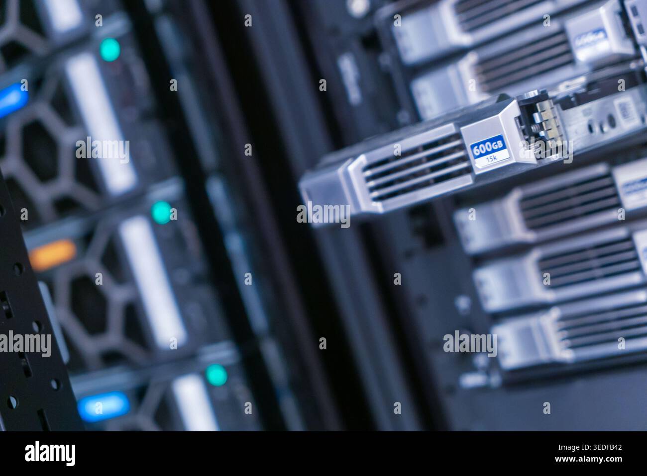 Close-up view of modern data storage technology inside a server rack, showcasing advanced hardware and components designed for efficient data manageme Stock Photo