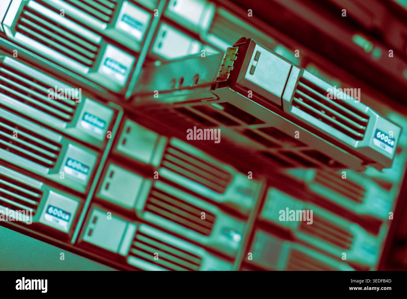 A close-up view of modern data storage server drives showcasing efficiency and technology in digital information management and backup solutions. Stock Photo