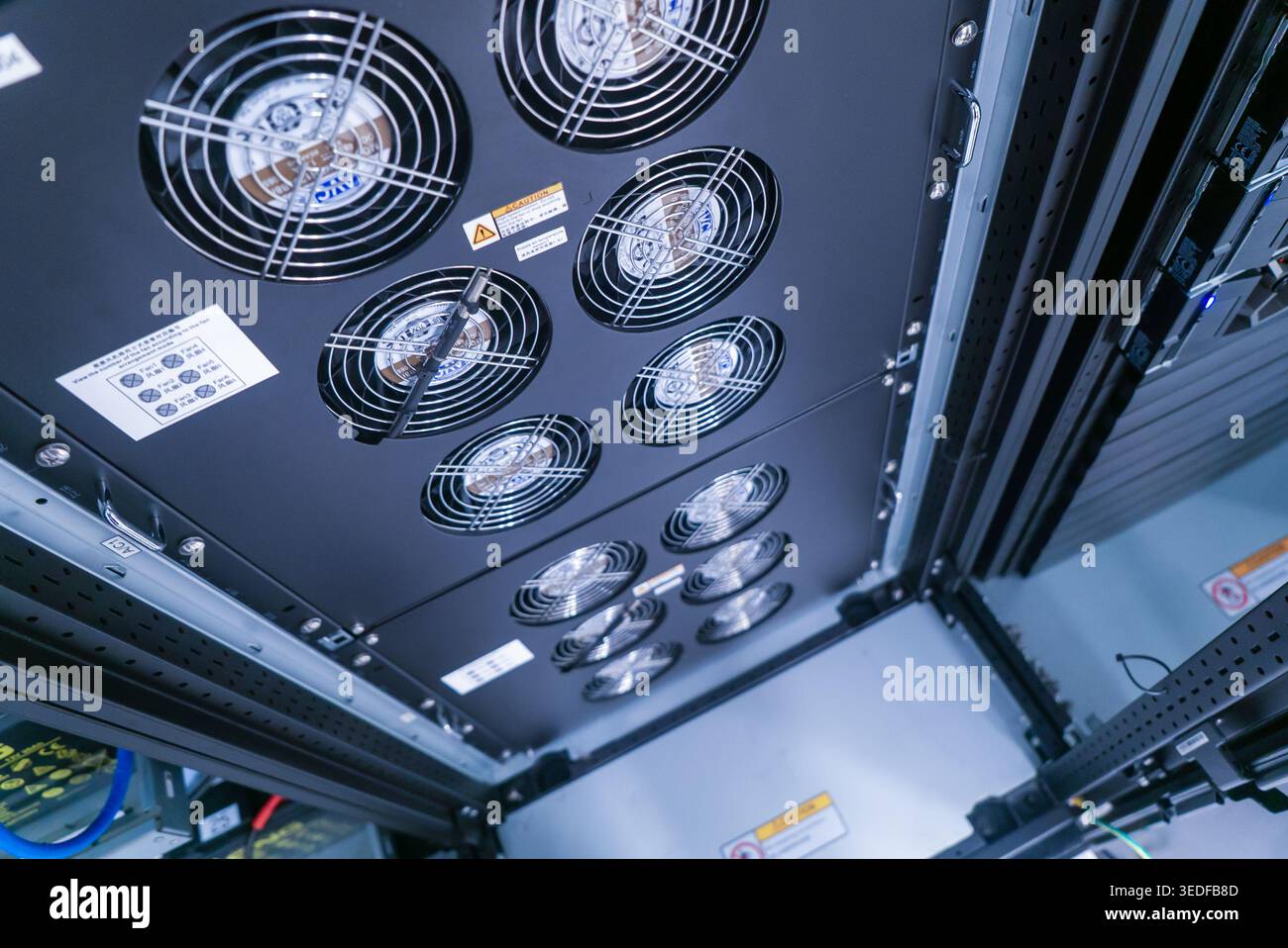 Multiple Fans View of multiple cooling fans installed in a data center equipment rack ...