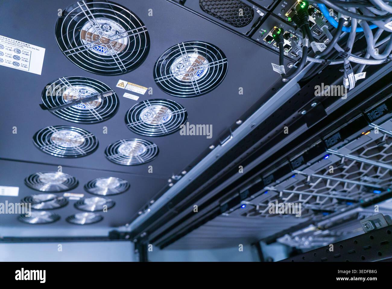Fans For Coling Racks A detailed view of cooling fans installed in a modern server rack ...