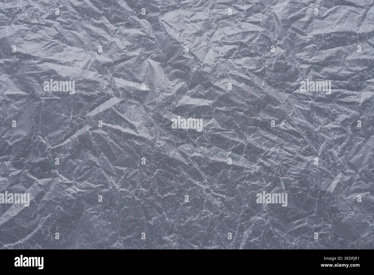Wrinkled plastic texture gray background with grunge pattern Stock Photo