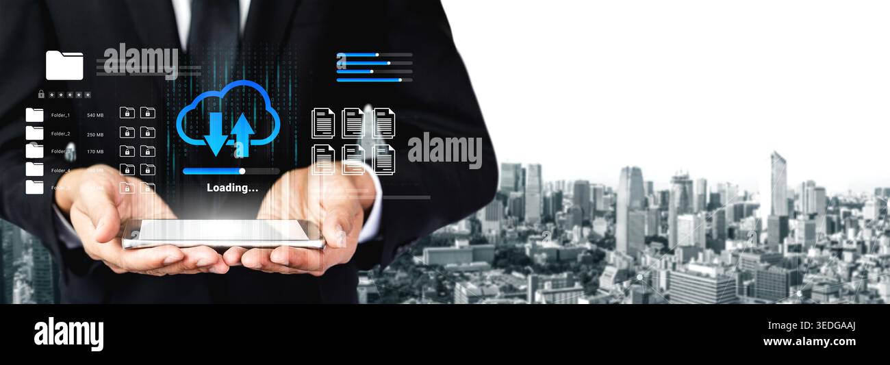 A businessman in a suit holds a tablet displaying a cloud data transfer graphic with a modern city skyline background, symbolizing technology and Stock Photo
