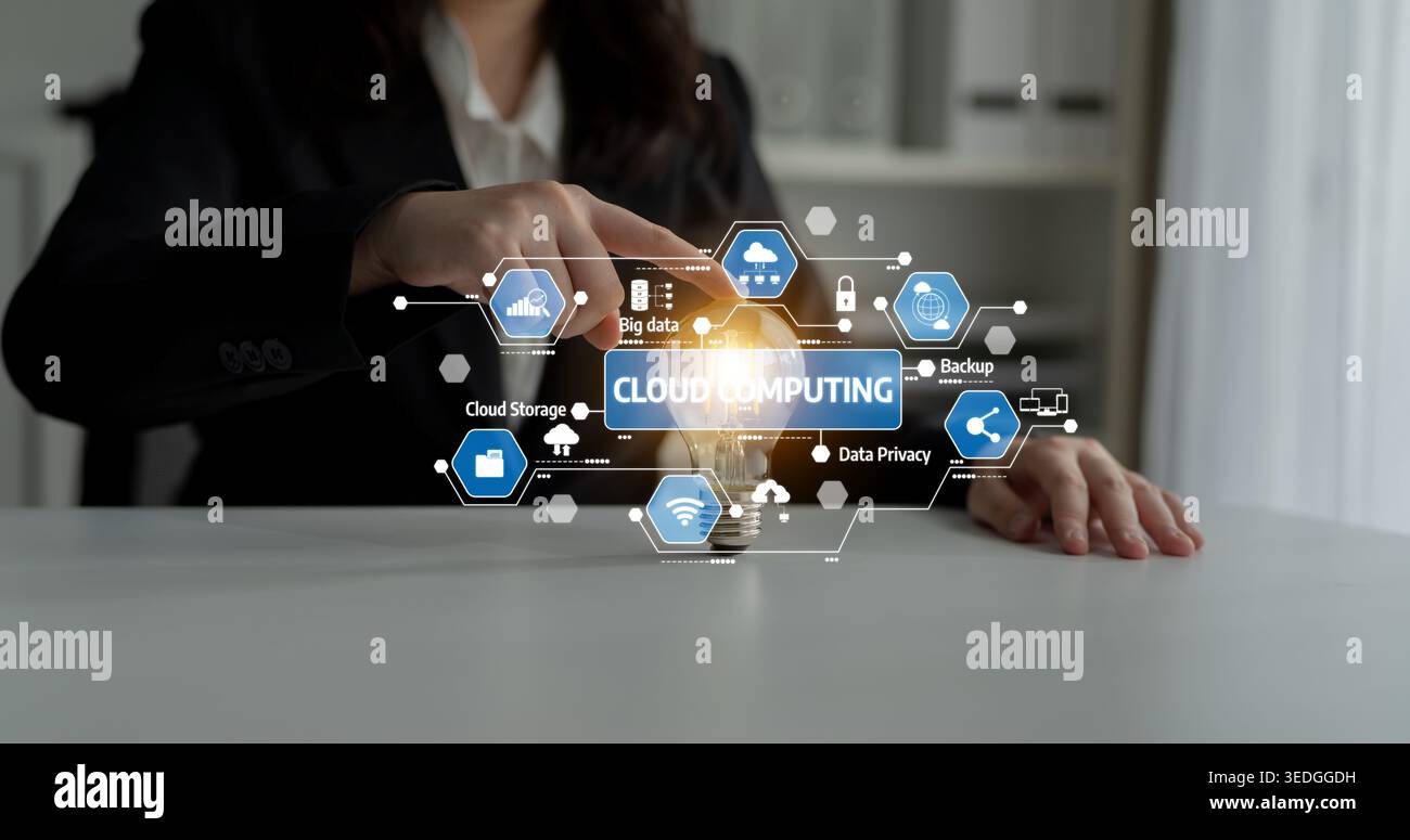 A business professional interacts with a digital cloud computing interface, illustrating modern technology impact on data security, innovation, and Stock Photo