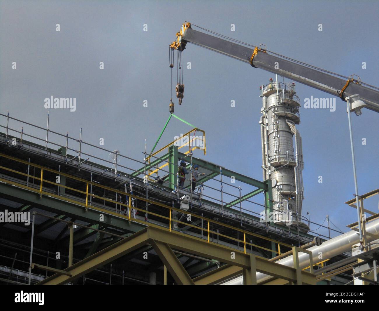 Crane Hook On Elevated Refinery Steel Platform Stock Photo