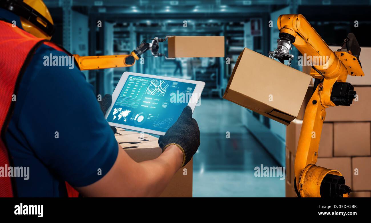 Smart robot arm systems for innovative warehouse and factory digital technology . Automation manufacturing robot controlled by industry engineering Stock Photo