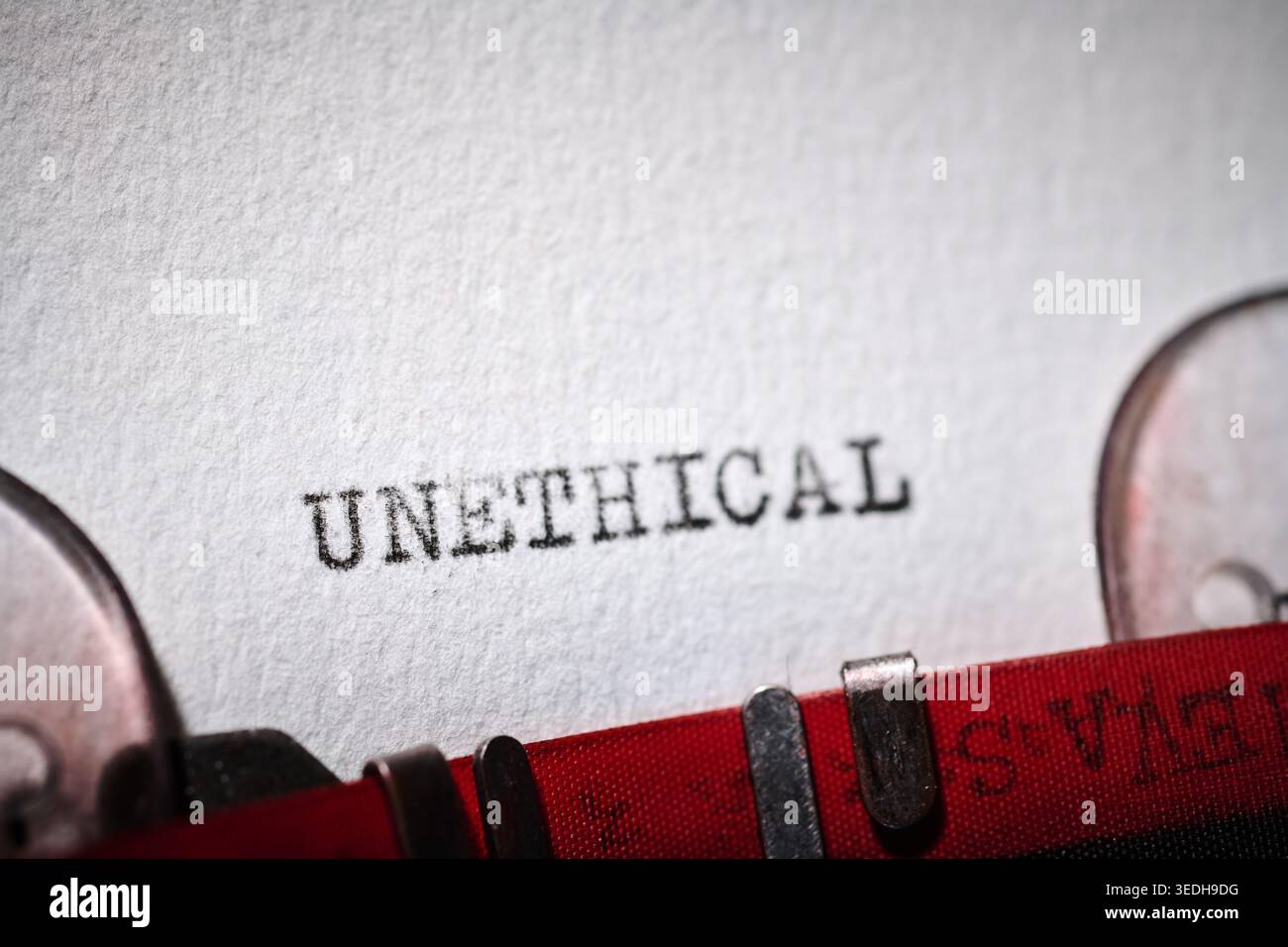 unethical word message concept written with a typewriter Stock Photo