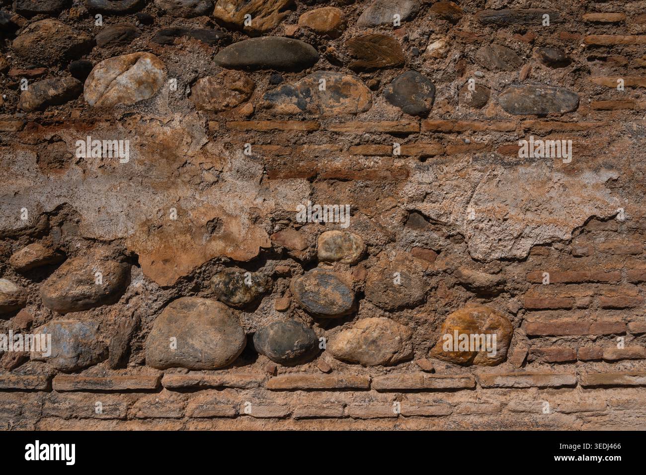 Ancient Stone and Brick Wall Texture Stock Photo