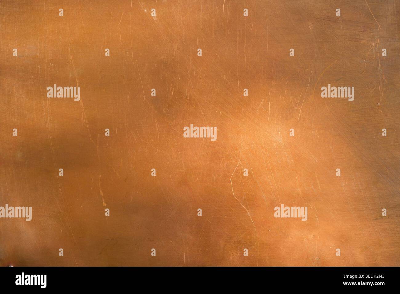 Warm сopper surface with different lighting. Minimal background. Industrial backdrop for design. Copy space. Stock Photo