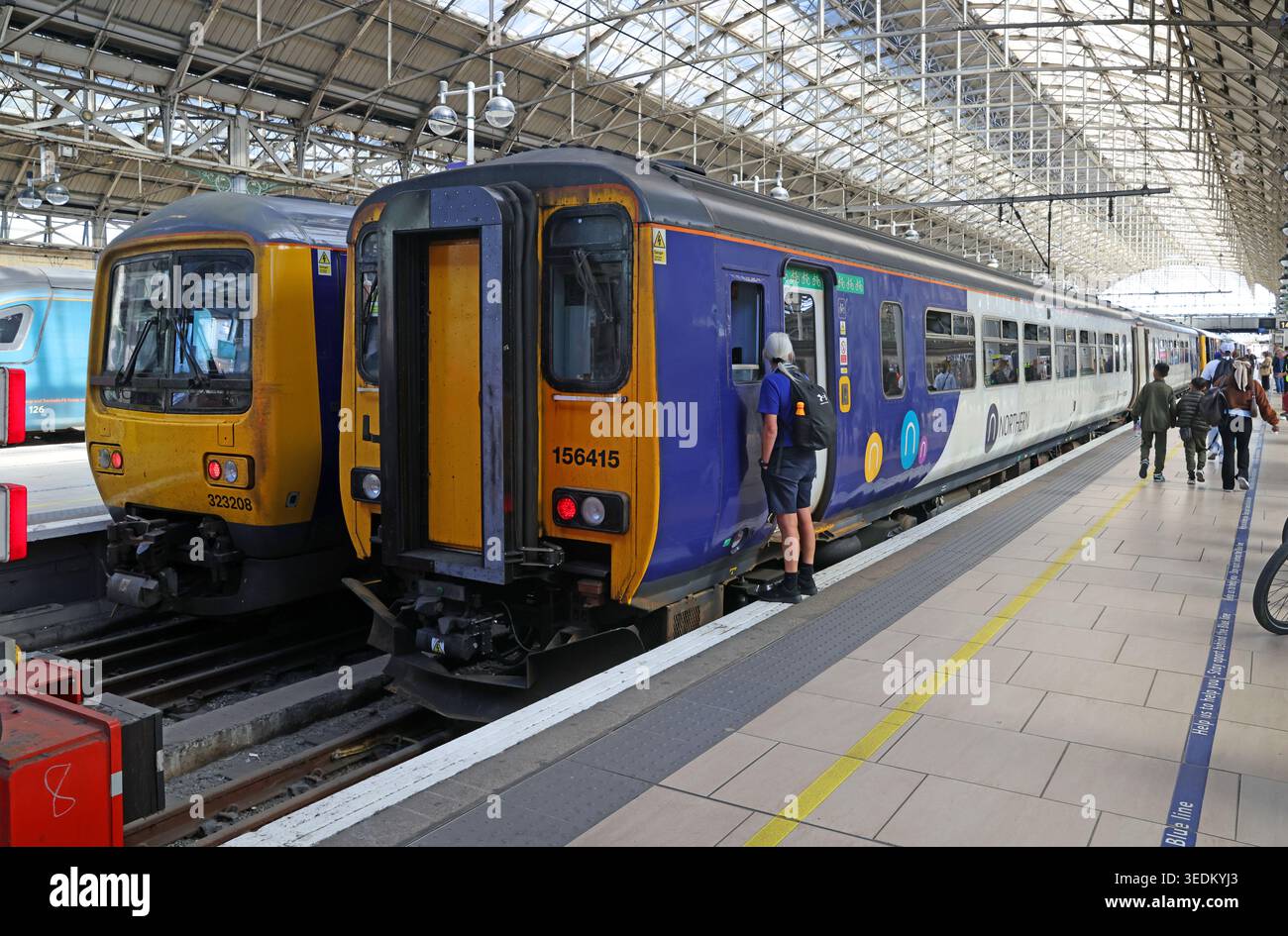 EMU 323208 & DMU 156415 at Manchester Piccadilly, Manchester, England, UK. Stock Photo