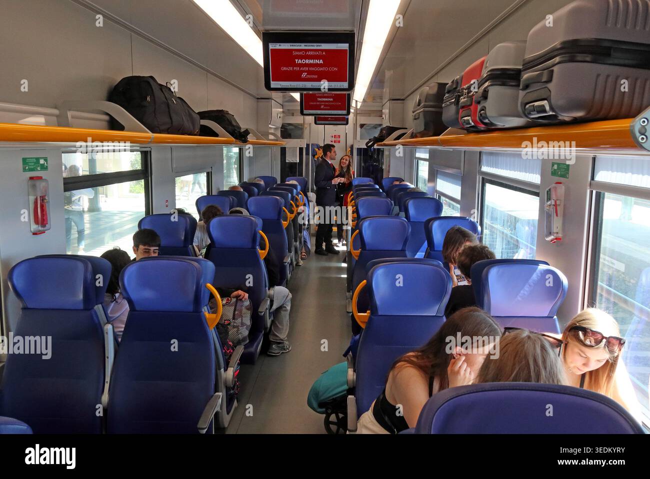 TrenItalia train interior Taormina to Messina, Sicily, Italy. Stock Photo